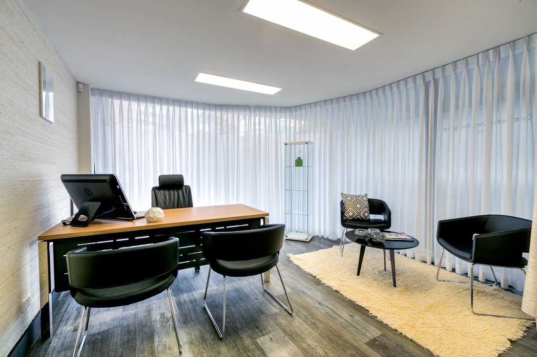 Doctor consultation room with sleek design aesthetic. Medical centre fit out costs were carefully incorporated into the design.